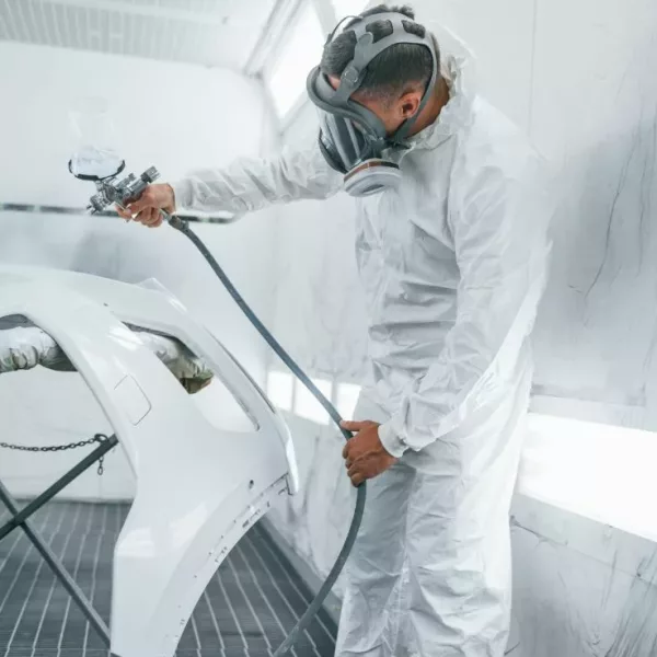 in-protective-mask-painting-the-car-caucasian-au-2021-09-03-02-37-26-utc-1.jpg