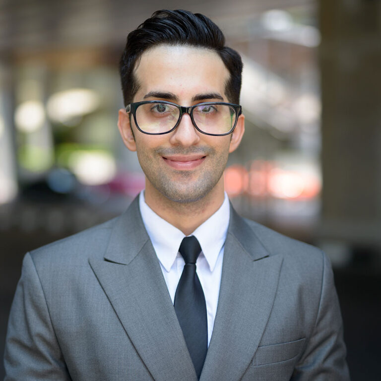 face-of-happy-young-handsome-persian-businessman-i-SPZRPFV.jpg