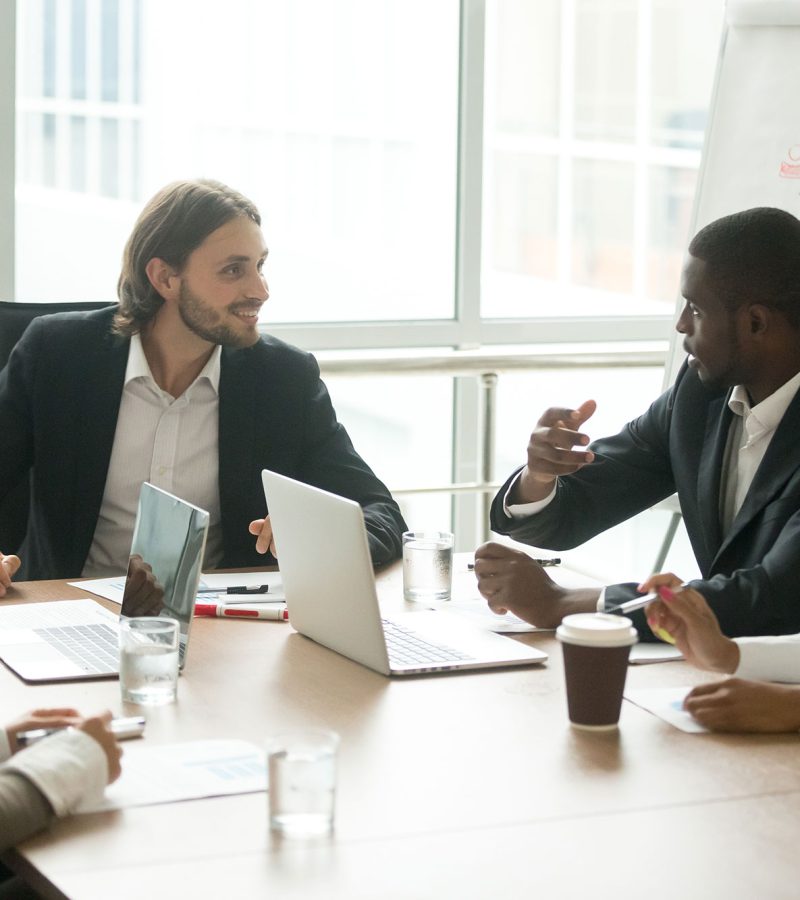 business-executives-discussing-project-ideas-at-te-LA7952R-1-1.jpg